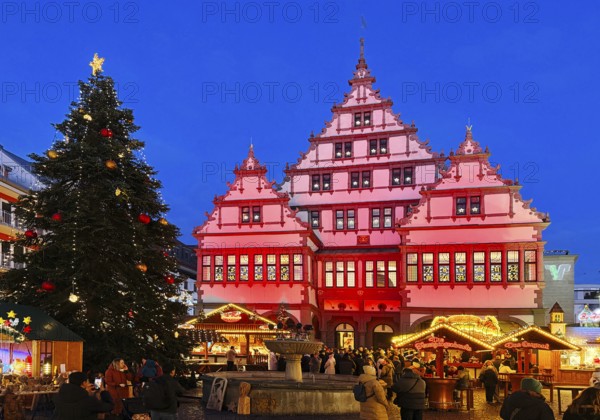 Weser Renaissance style town hall with Christmas market on Town Hall Square, Rathausplatz, Rathausplatz in the evening, Paderborn, North Rhine-Westphalia, Germany