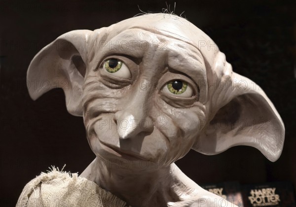 Dobby sculpture, house elf, movie character of Harry Potter in a bookstore, Paderborn, North Rhine-Westphalia, Germany