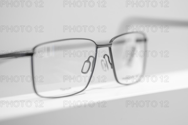 Close-up of a simple, modern metal eyeglass frame, optician, Pforzheim