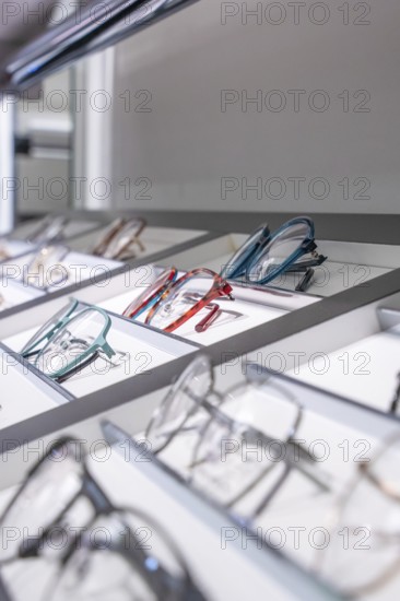 Stylish shelf with a selection of modern, colorful glasses, optician, Pforzheim