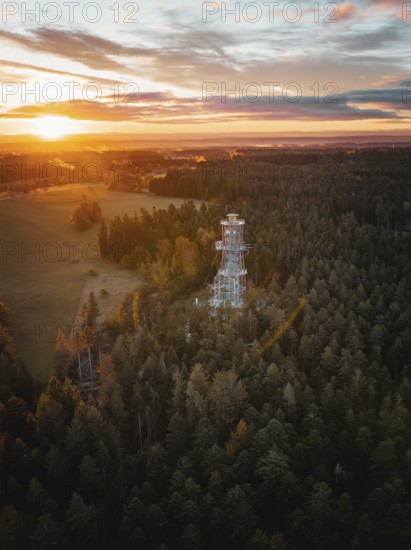 Landscape view with observation tower in foreground and sunset, Himmelsglück observation tower with Flying Fox, Schömberg, Black Forest, Germany