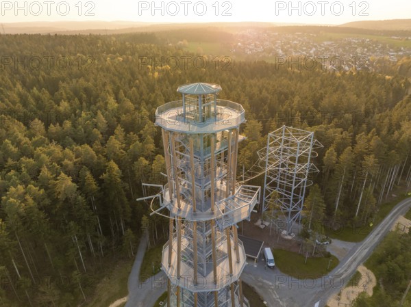 A high observation tower in the forest, surrounded by trails and illuminated by evening light, Himmelsglück observation tower with Flying Fox, Schömberg, Black Forest, Germany