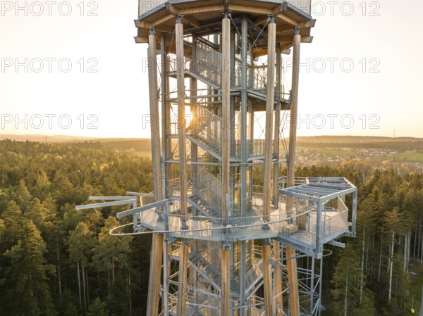 Metal observation tower at sunset surrounded by thick forests, Himmelsglück observation tower with Flying Fox, Schömberg, Black Forest, Germany