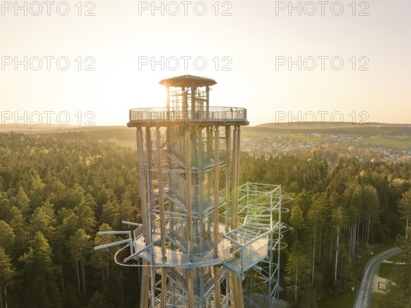 Detailed view of a modern tower, sunlight penetrating the structure in a forest, Himmelsglück observation tower with flying fox, Schömberg, Black Forest, Germany