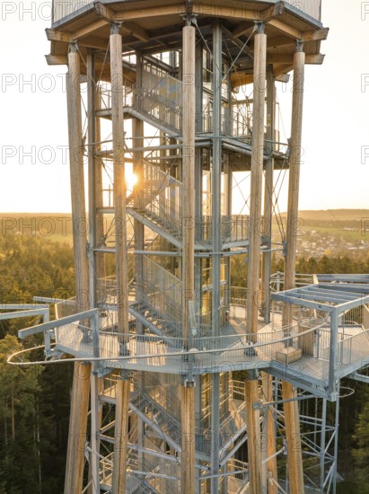 Detailed view of a metallic observation tower in the forest at sunset, Himmelsglück observation tower with flying fox, Schömberg, Black Forest, Germany