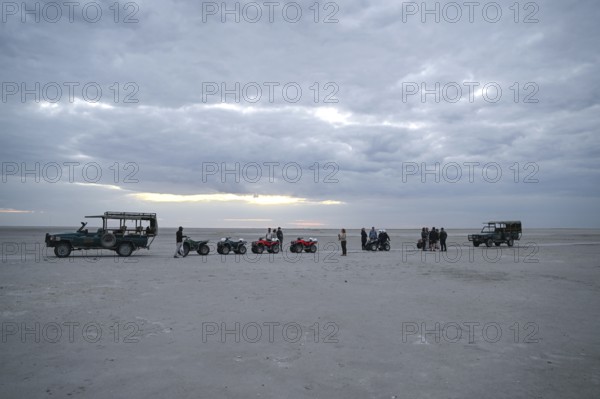 Tourists on a quad bike tour to the Makgadikgadi Salt Pans, Makgadikgadi Pans National Park, Gweta, Central District, Botswana
