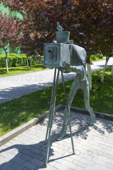 Bronze statue of a photographer with an antique camera in a park, statue in Borjomi Park, Borjomi resort, Kura River, Samtskhe-Javakheti region, Lesser Caucasus, Georgia