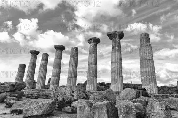 Eight pillars, Temple of Heracles, ruins in the Valley of the Temples, restoration, monochrome, Agrigento, Sicily, Italy