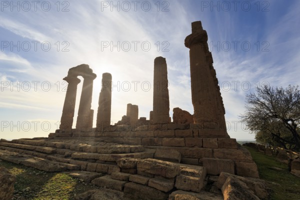 Temple of Heracles, ruins in the Valley of the Temples, restoration, backlight, sunbeams, Valley of the Temples, Agrigento, Sicily, Italy