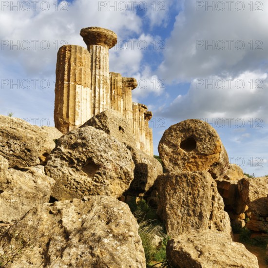 Columns, boulders, Temple of Heracles, ruin in the Valley of the Temples, Cumulus, Agrigento, Sicily, Italy