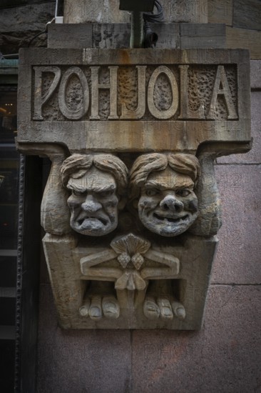 Trolls, stone figures from Kalevala, art nouveau architecture, Pohjola insurance building, Alexanterinkatu, main shopping street in the city center, Helsinki, Finland