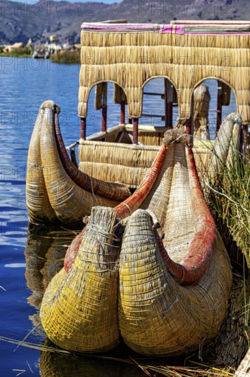 Traditional boats made of reeds on a lake, handmade, The floating reed islands of the Uros in Lake Titicaca in Peru
