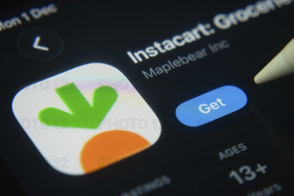 Dhaka, Bangladesh- 01 Dec 2025: A close-up of the Instacart app icon in the App Store on an iPad screen
