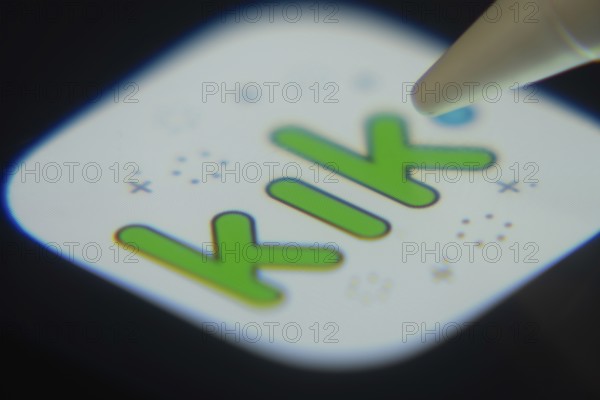 Dhaka, Bangladesh- 06 Dec 2025: Close-up of the Kik app on a screen with a stylus pointing at it
