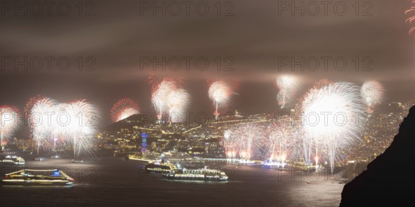 New Year's Eve fireworks, dusk, Atlantic Ocean, harbour with cruise ships, Funchal, Madeira, Portugal