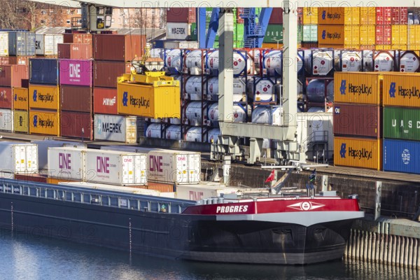 The port of Mannheim is one of the most important inland ports in Europe. The harbor basins stretch across the Rhine and Neckar. Container terminal in Mühlauhafen. Mannheim, Baden-Württemberg, Germany