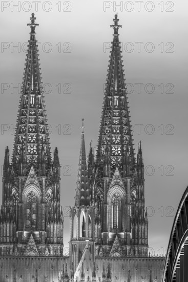 Evening atmosphere, Cologne Cathedral illuminated with LED lamps and the Hohenzollern Bridge, Cologne, North Rhine-Westphalia, Germany