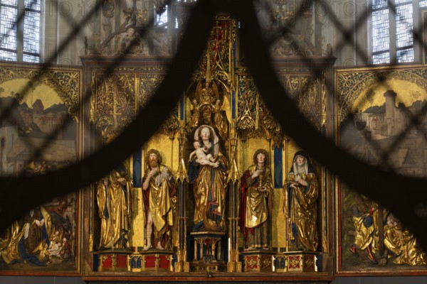 Mother of God on the crescent moon with baby Jesus, elevated on a pedestal, left and right John the Baptist and John the Evangelist, high altar, shrine and predella, chancel with movable pair of double wings suitable for the festivals of the church year, Blaubeuren Abbey, Swabian Jura, Baden-Württemberg, Germany