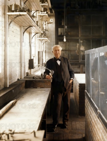 Thomas Alva Edison with his lightbulb, digitally edited