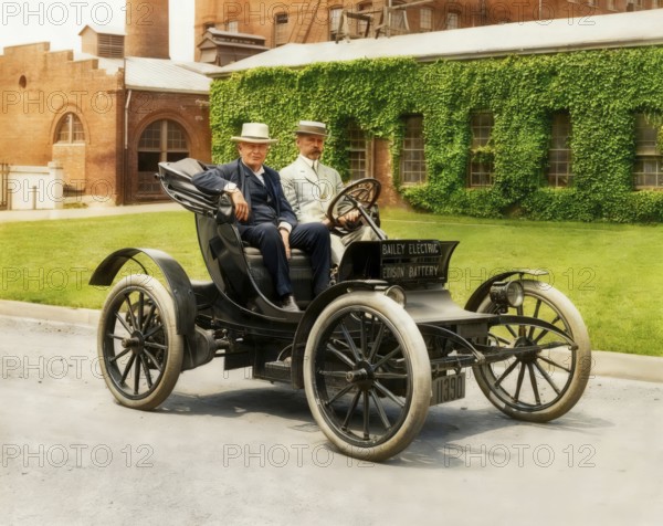 Thomas Alva Edison and Col. E.M.E. Bailey in Bailey Electric automobile powered by Edison Storage Batteries, 1910, digitally edited