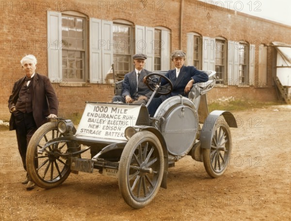 Thomas Edison with his Electric automobile 1910, together with Captain W. Langdon, Bailey Co. test driver and Frank McGuiness, Edison Co. Engineer, 1000 Mile Endurance Run Bailey Electric New Edison Storage Battery, digitally edited