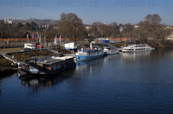 Boats, ships anchor at Wilhelma am Neckar pier, Neckar-Käptn, passenger shipping, Stuttgart, Baden-Württemberg, Germany