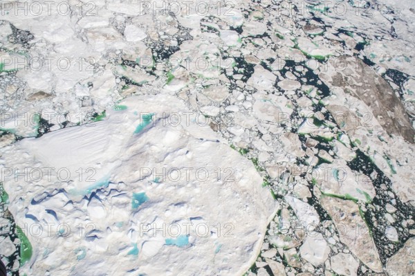 Aerial view of melting icepack and icebergs, Greenland (Kalaallit Nunaat), Arctic Ocean, climate change, global warming, geographically part of North America, politically part of the Kingdom of Denmark