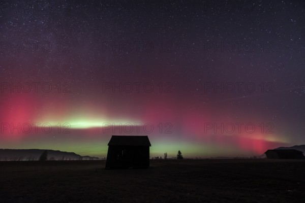 Northern lights, aurora borealis, solar storm, January 2026, red, green, hut, Loisach-Lake Kochel-Moore, Alpine foothills, Bavaria, Germany