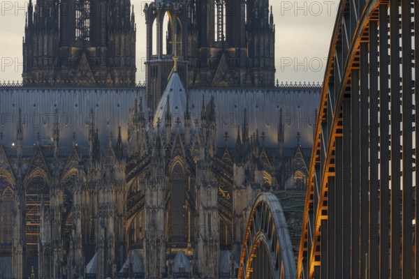 Evening atmosphere, Cologne Cathedral illuminated with LED lamps and the Hohenzollern Bridge, Cologne, North Rhine-Westphalia, Germany