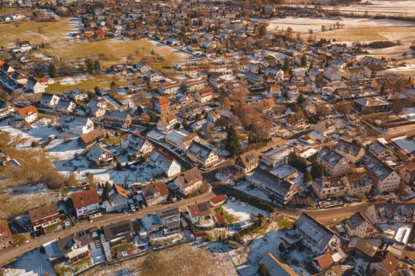 Close-up of a village in winter, with dense houses and snow-covered roads, Hallwangen, Freudenstadt district, Germany