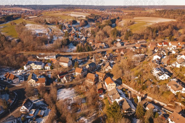 Snowy village spread over rolling hills with a clear view of the surrounding area, Aach, Dornstetten, Freudenstadt district, Germany