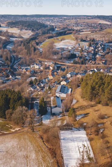 Winter scene with a village and adjacent fields in a wooded region, Aach, Dornstetten, Freudenstadt district, Germany