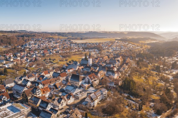 Picturesque winter town with historic buildings and surrounding hills, Dornstetten, Freudenstadt district, Germany