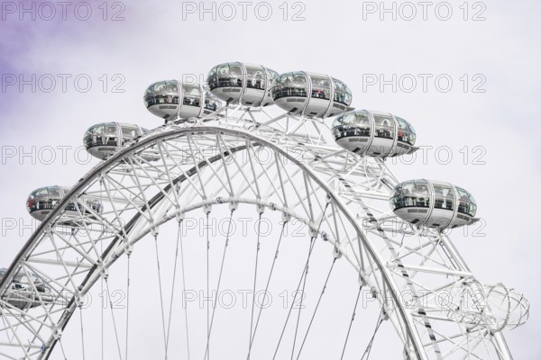 Close-up of the tip of a Ferris wheel, the capsules are clearly visible, London Eye, London, United Kingdom