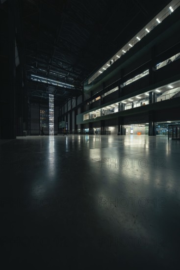 Expansive, dark room with industrial design, Tate Modern of Art, Lodon, United Kingdom