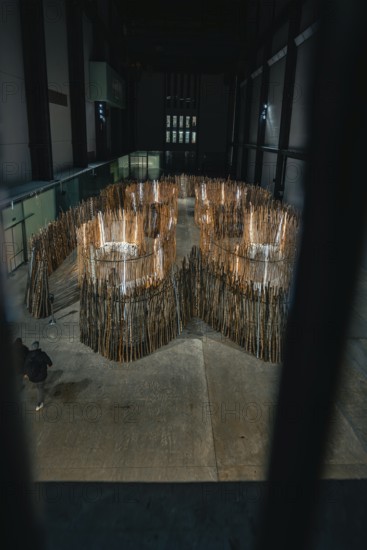 Wooden maze in a dark, modern setting, Tate Modern of Art, Lodon, United Kingdom