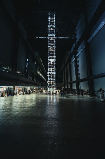 High room with luminous installation, dark industrial atmosphere, Tate Modern of Art, Lodon, United Kingdom