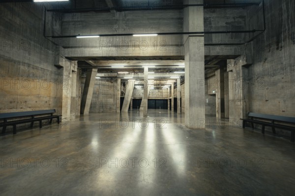 Empty industrial hall with concrete walls and light strips, Tate Modern of Art, Lodon, United Kingdom