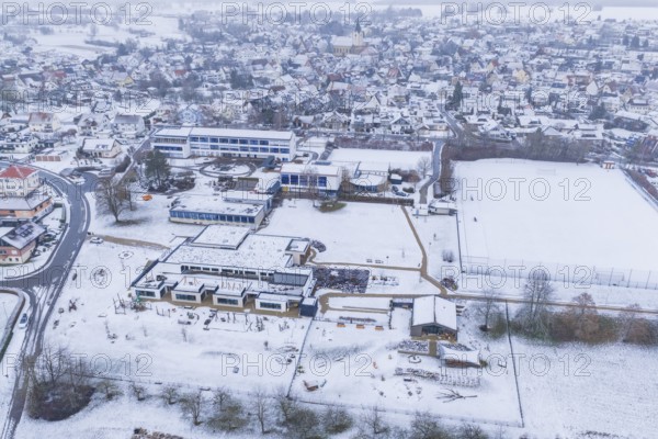 Village with snow-covered roofs, modern and historic buildings, Empfingen, Freudenstadt district, Germany