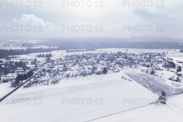 Winter panorama of a snowy village with surrounding fields, Wiesenstetten, Freudenstadt district, Germany