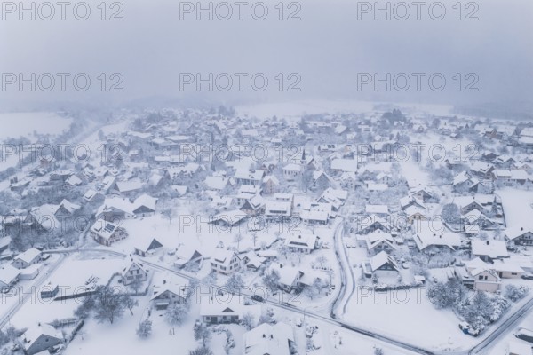 Landscape of a quiet, snowy village in winter silence, Schopfloch, Freudenstadt district, Germany