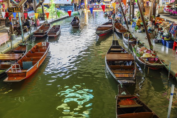 Wooden boats on the Damneon Saduak floating markets channel, near Bangkok, Ratchaburi district, Thailand