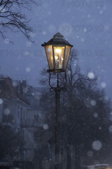 Street light in winter, snow, Germany