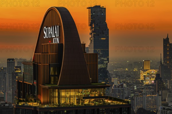 Over the rooftops of Bangkok, sunset, roof structure of the luxury residential residence Supalai Icon, view from the Moon Bar on the roof terrace of the Banyan Tree hotel, Sathon, Bangkok, Thailand's metropolis, Thailand