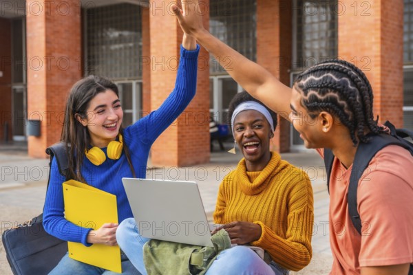 Diverse group of university students collaborating, celebrating a successful academic achievement with a high five, expressing joy and teamwork on campus