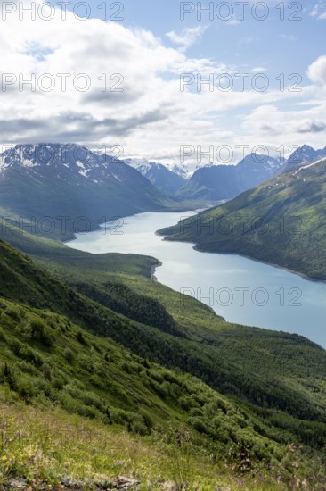 View of blue lake and mountains on Twin Peaks Trail, Eklutna Lake, Chugach Mountains, Chugach State Park, Alaska, USA