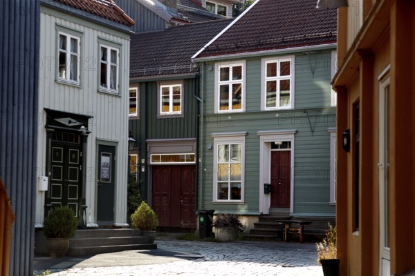 Colourful houses with characteristic details and shadows, Trondheim, Trøndelag, Norway