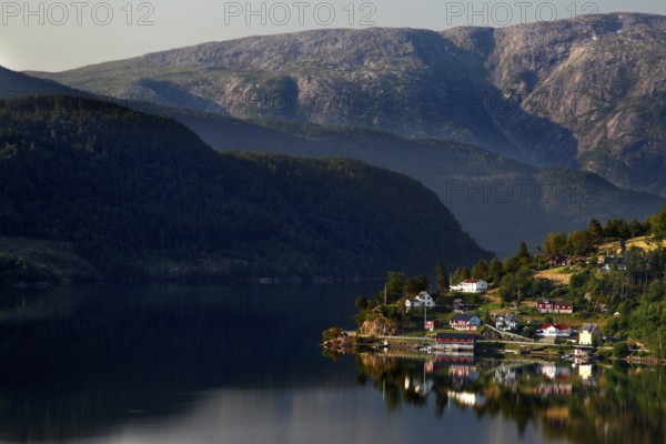 Picturesque village on Hardangerfjord with mountains in the background, Ulvik, zero, Norway