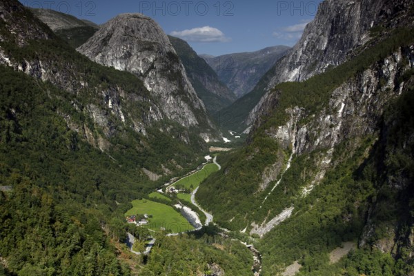 Breathtaking view of the Nærøy Valley with green valley floor and steep rock walls, Stalheim, Norway