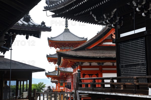 Rooflines and pagodas of Kiyomizu Temple in historical setting, Kyoto, Kansai, Japan